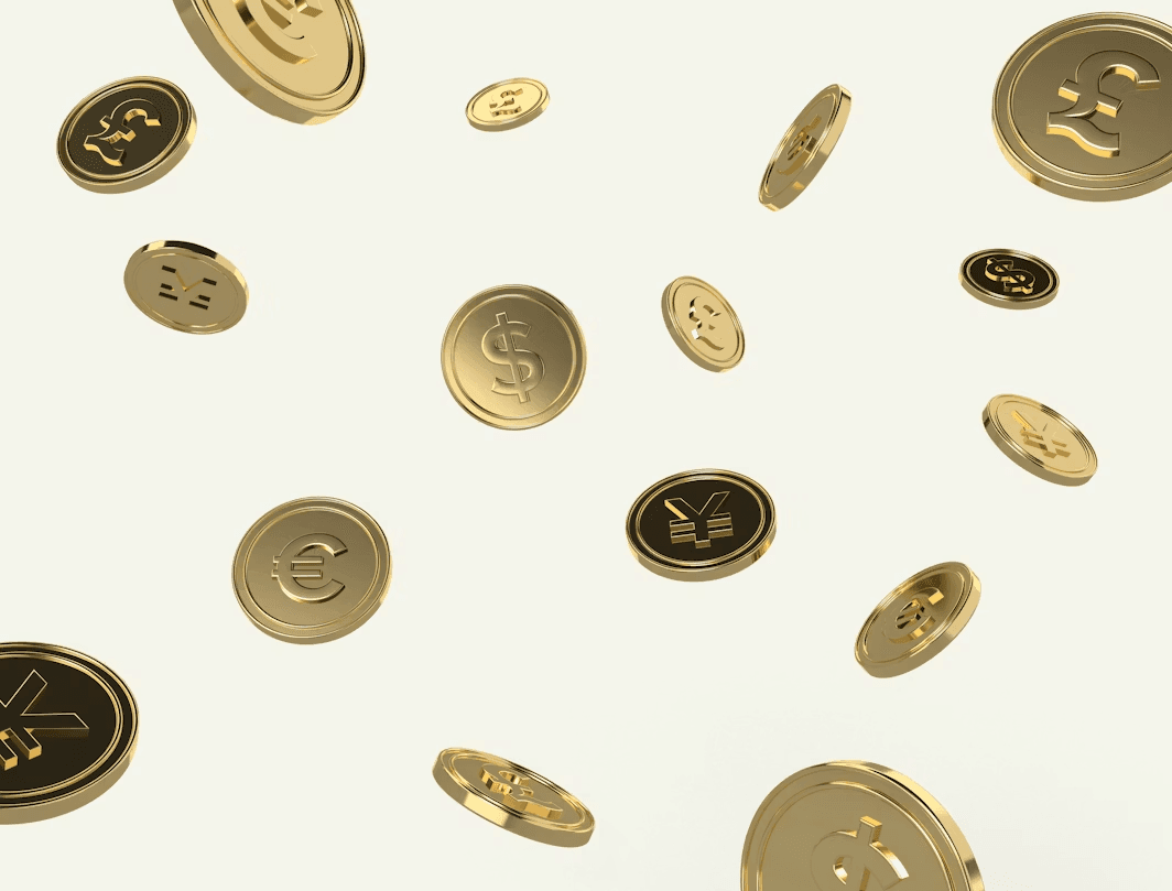 Floating gold coins on a soft neutral background