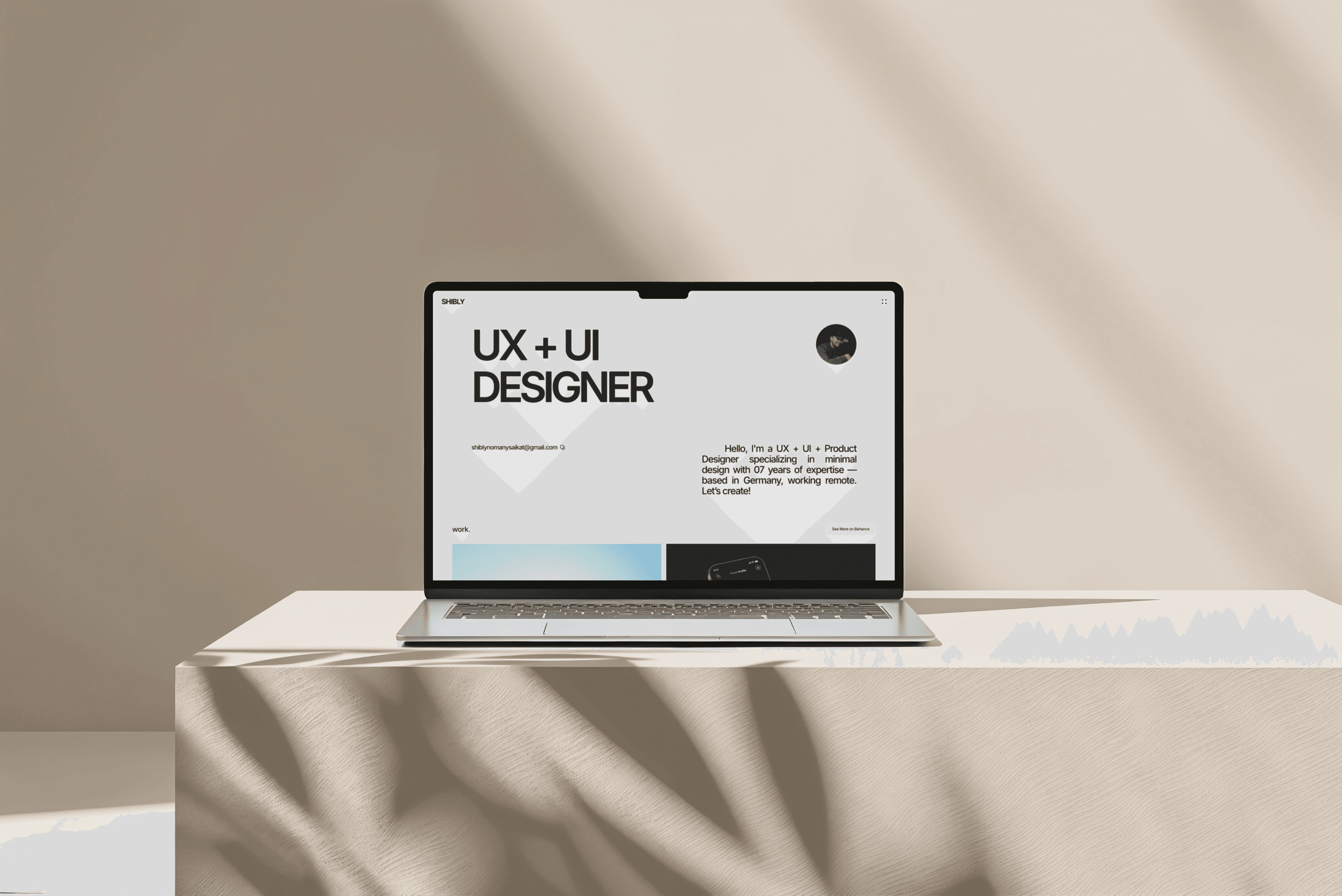 Laptop showing a UX and UI designer portfolio website